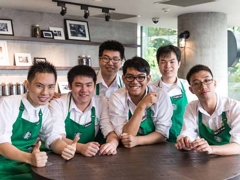 Happy Faces….E2C-trained Starbucks employees at Fullerton Waterboat House