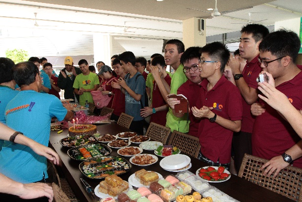 Happy birthday…SLC members, volunteers and facilitators enjoying a scrumptious meal